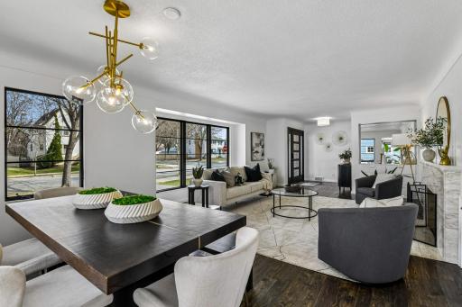 Natural light floods the living and dining room
