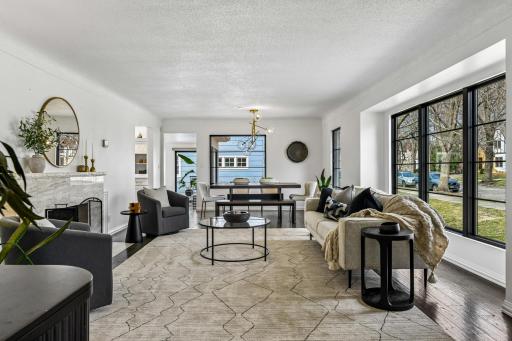 Oversized, new windows fill the spacious gathering areas with natural light