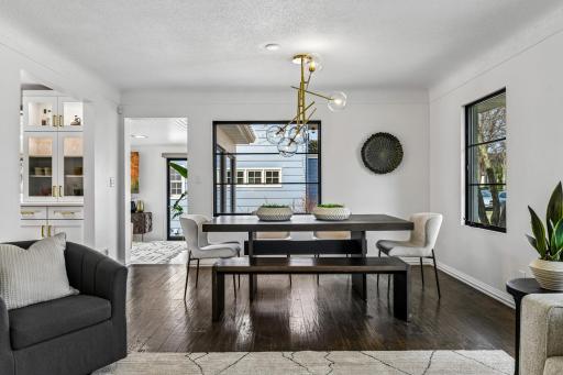 The spacious dining area offers ample space to accommodate seating for 8 or more.