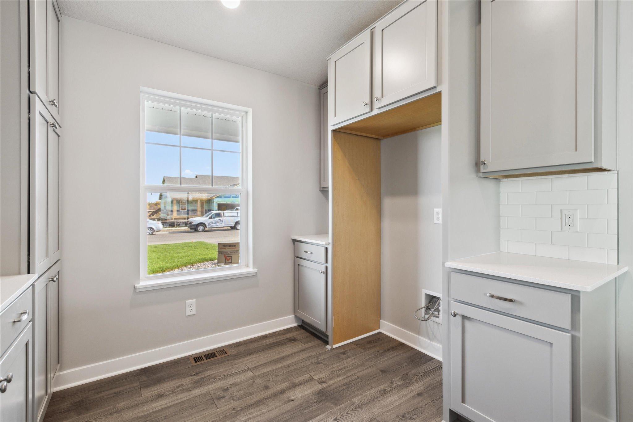 Large kitchen window allows the natural light to soak this amazing space. *Picture of model home; actual finishes may vary.