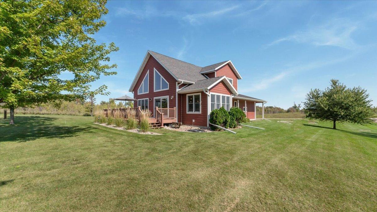 30381 Wildwood Rd, Ashby, MN 56309.Smart Board Siding, maintenance free decking, covered rear porch.