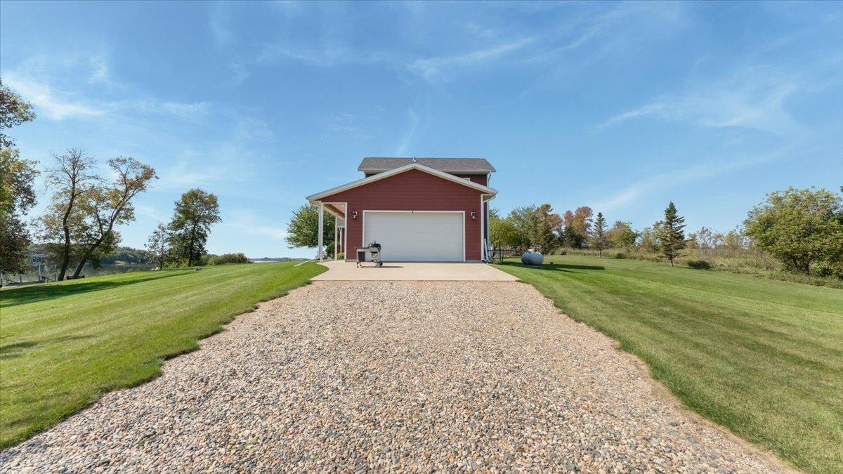 30381 Wildwood Rd, Ashby, MN 56309.Attached Double Garage, plenty of room for an additional building road side and a small lakeside shed per the county!