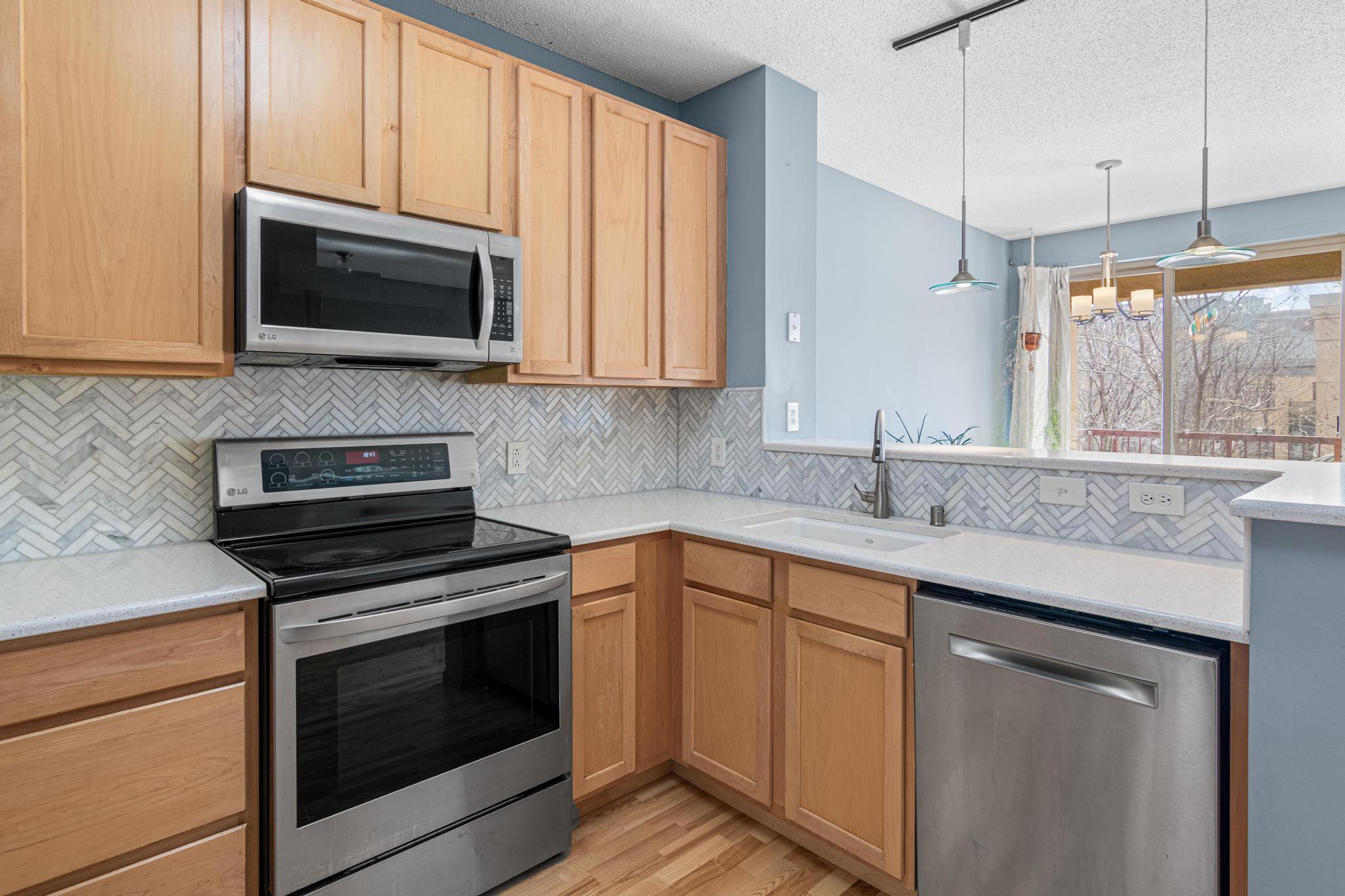 Quartz Countertops, Tiled Backsplash