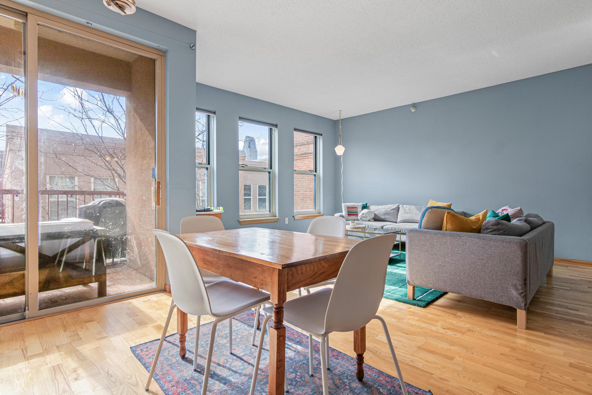 Dinning Room with Large Windows and Covered Patio for Hosting/Grilling