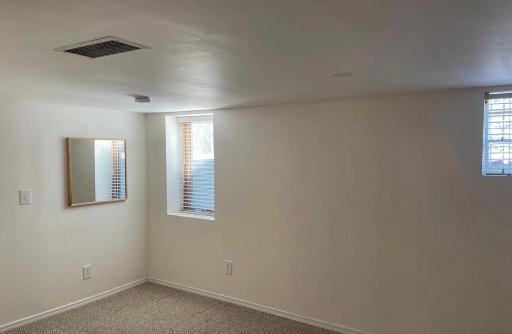 4th bedroom in lower level with attached living area