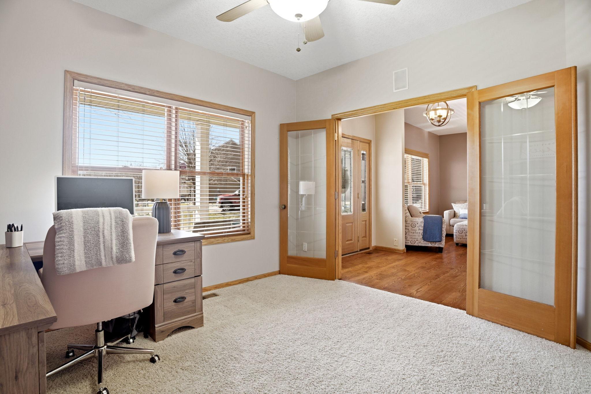 Front office with an open view into the living room.