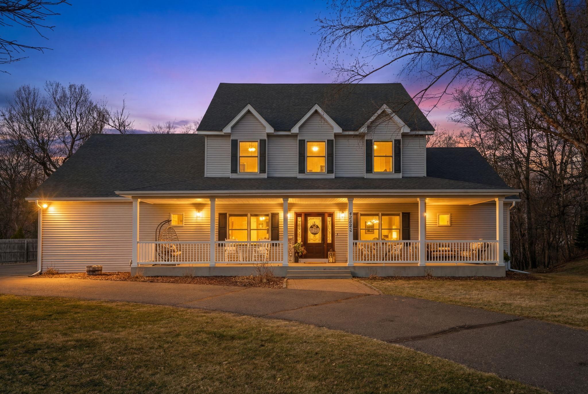Beautiful two-story home nestled on a quiet cul-de-sac, featuring 4 bedrooms and 4 bathrooms, surrounded by mature trees.