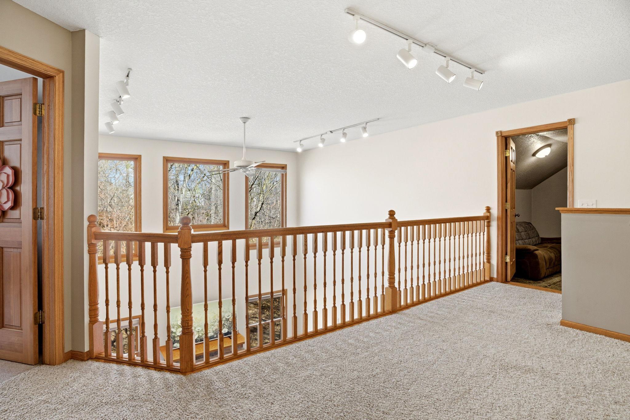 Enjoy sweeping views from the second level into the great room, with a versatile bonus room at the top of the stairs ideal for a home theater or media space.