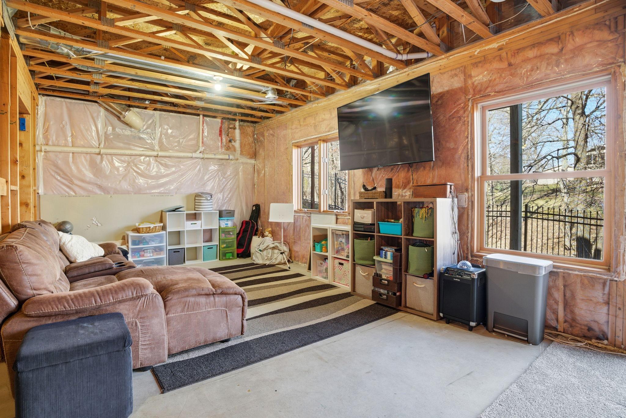 Generous unfinished basement with limitless potential, enhanced by a sauna and direct walkout to the beautifully fenced backyard.