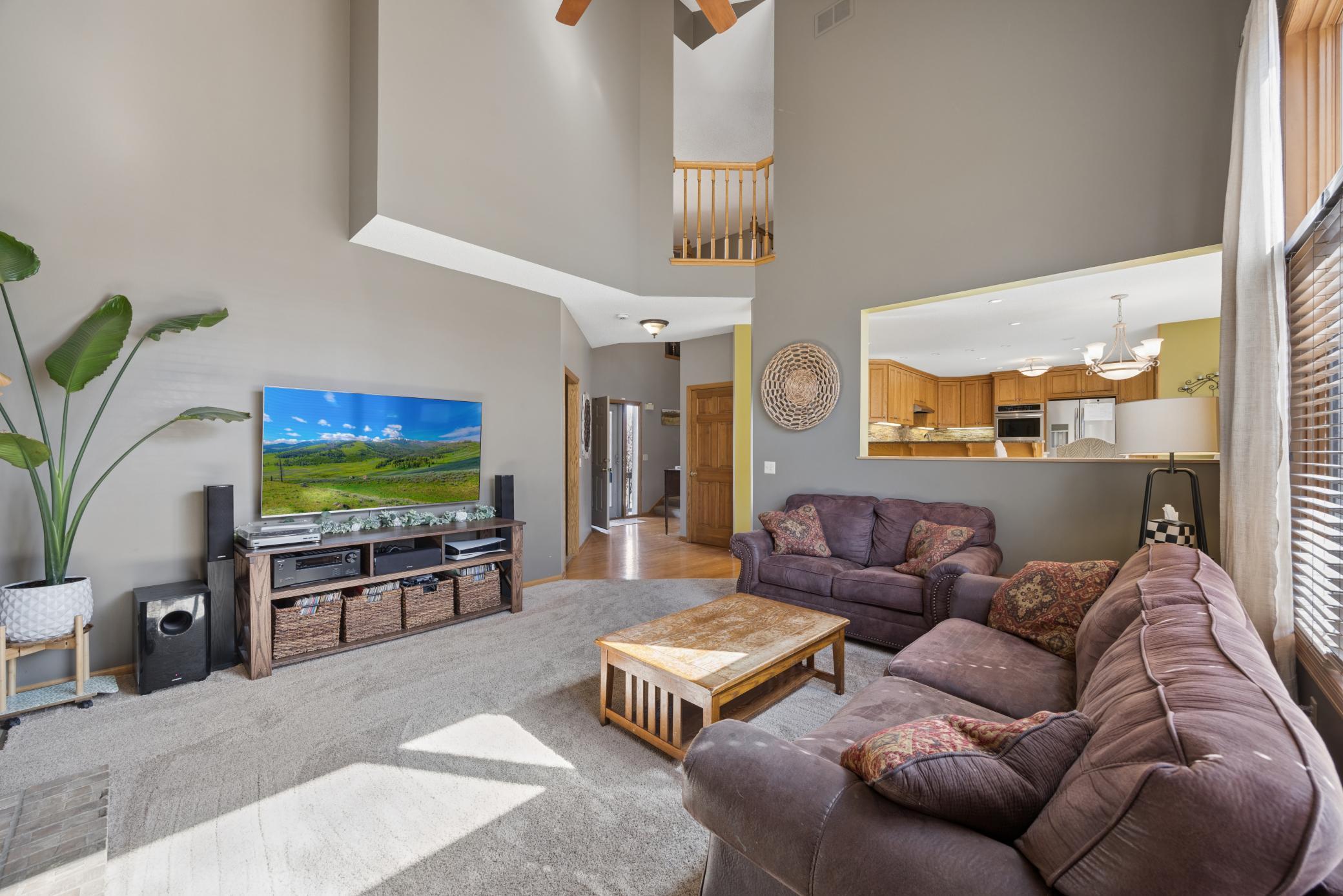 Reverse view of two story living room