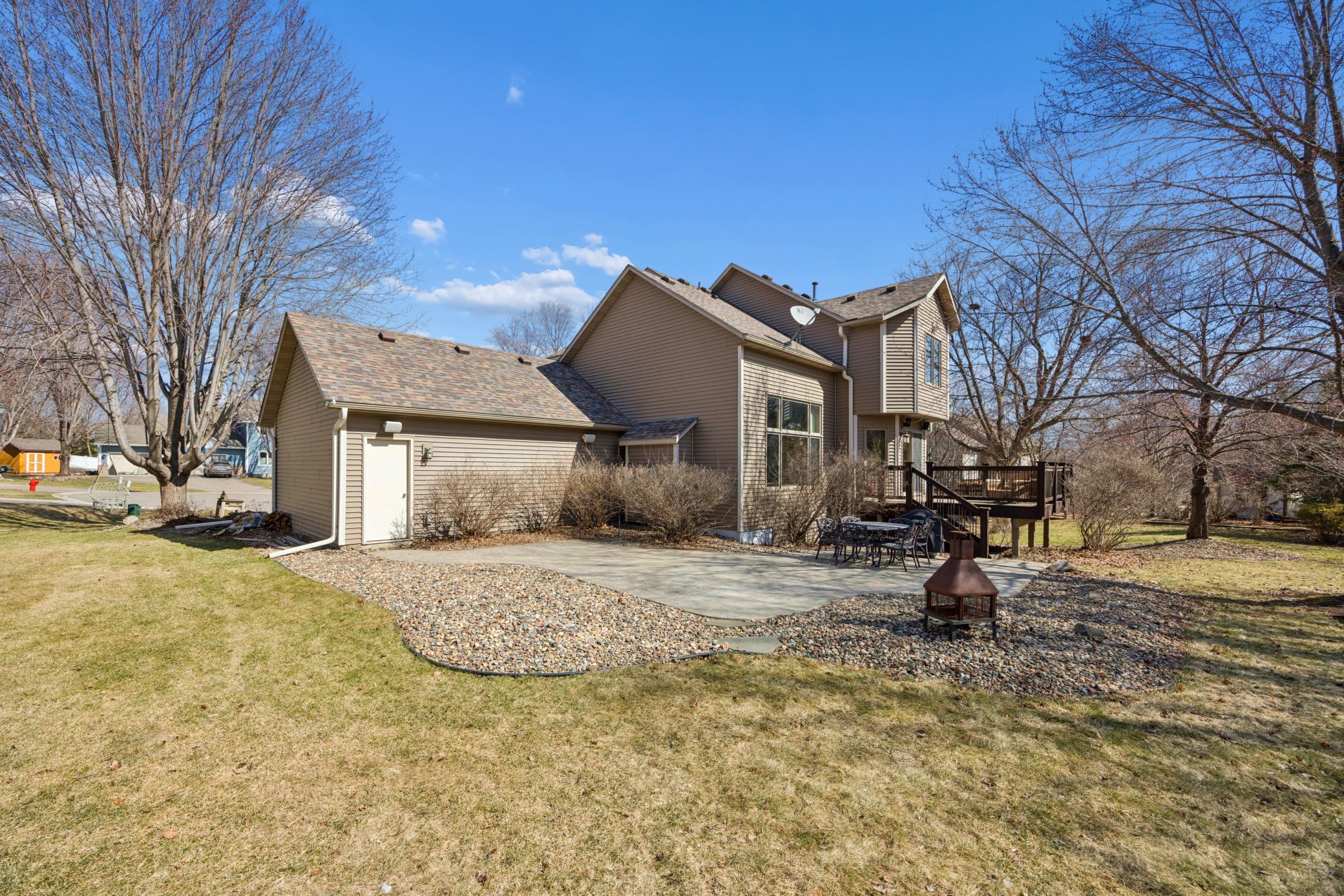 Large paver patio creates another outdoor gathering space to enjoy those Summer days