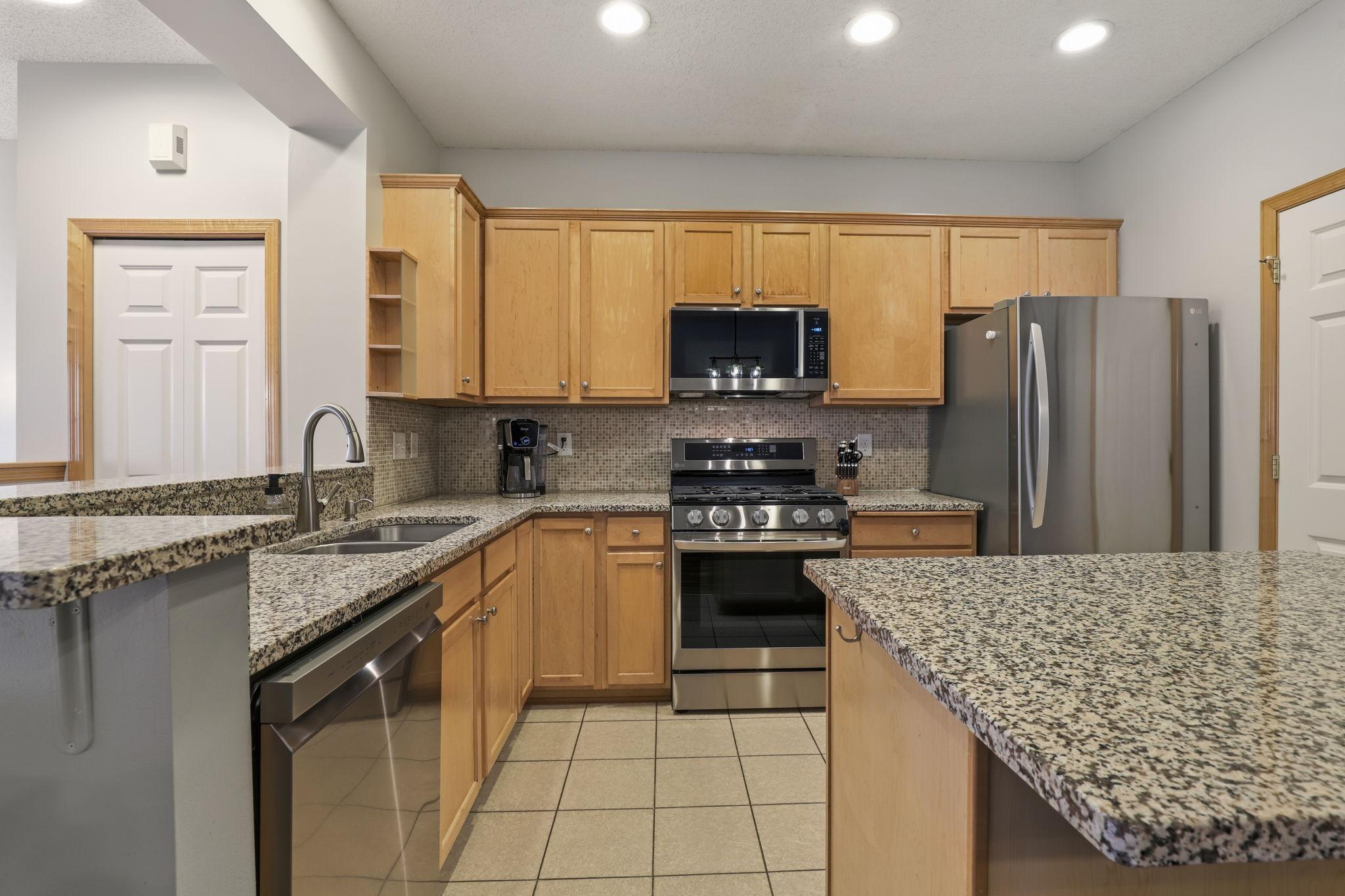 Granite countertops and Stainless steel appliances!