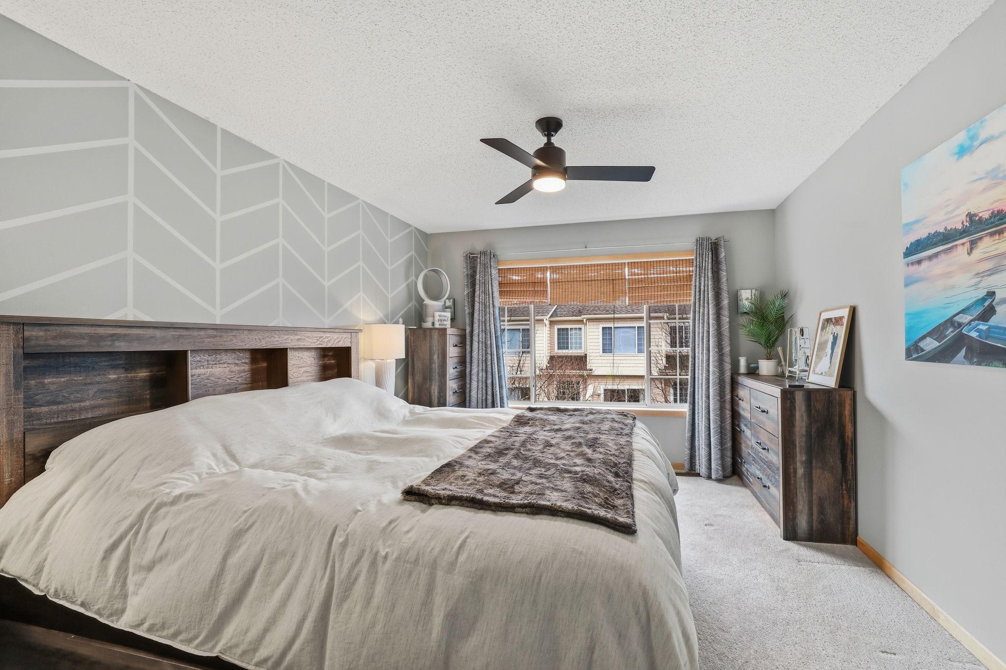 Primary BR also has ceiling fan, large windows to let in lots of sunshine!