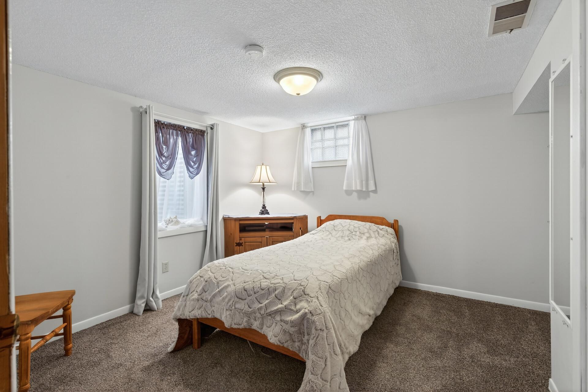 Fourth bedroom located in the lower level.