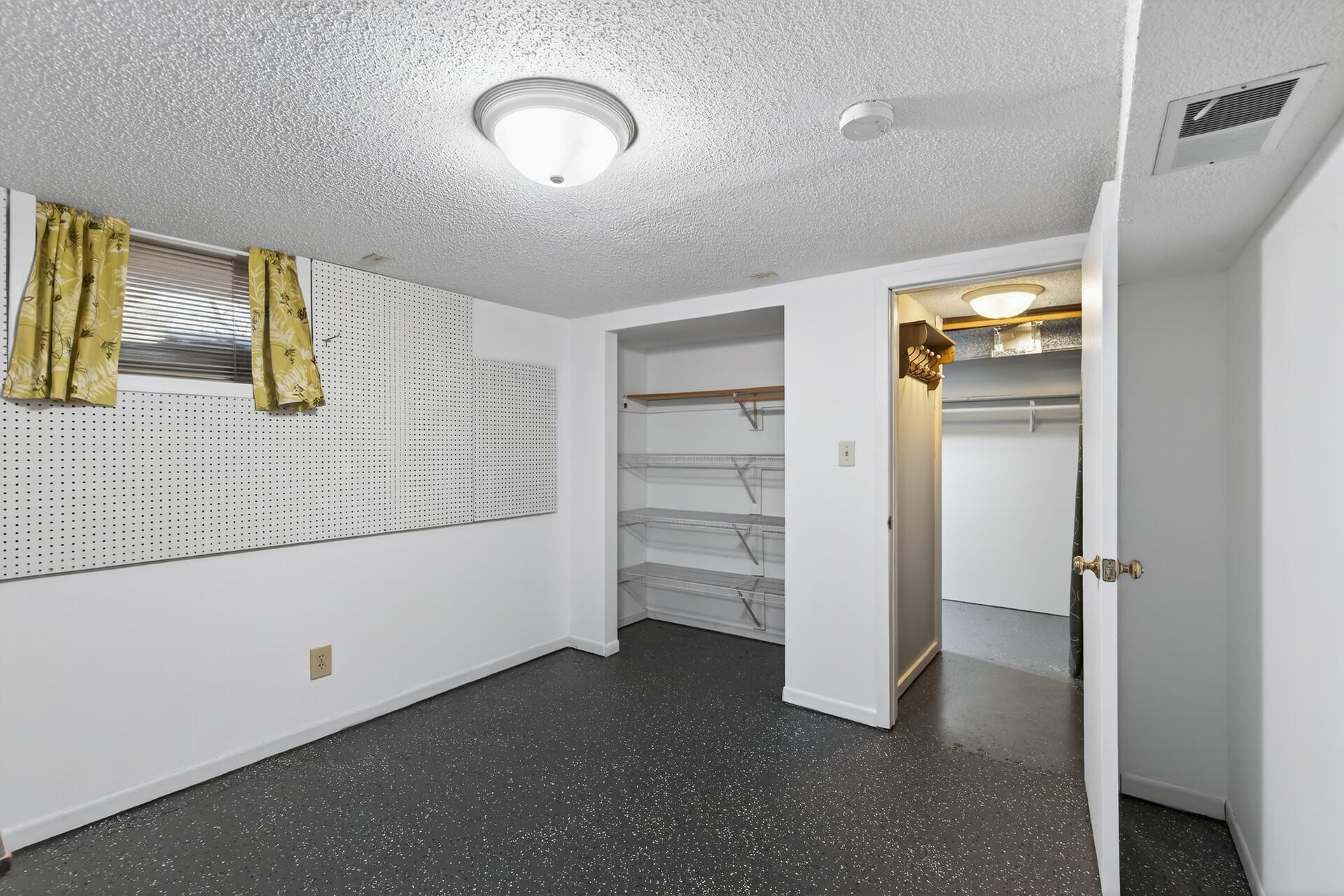 Bonus room set up as a craft space now, with the option to turn it into a 5th bedroom once an egress window is added.