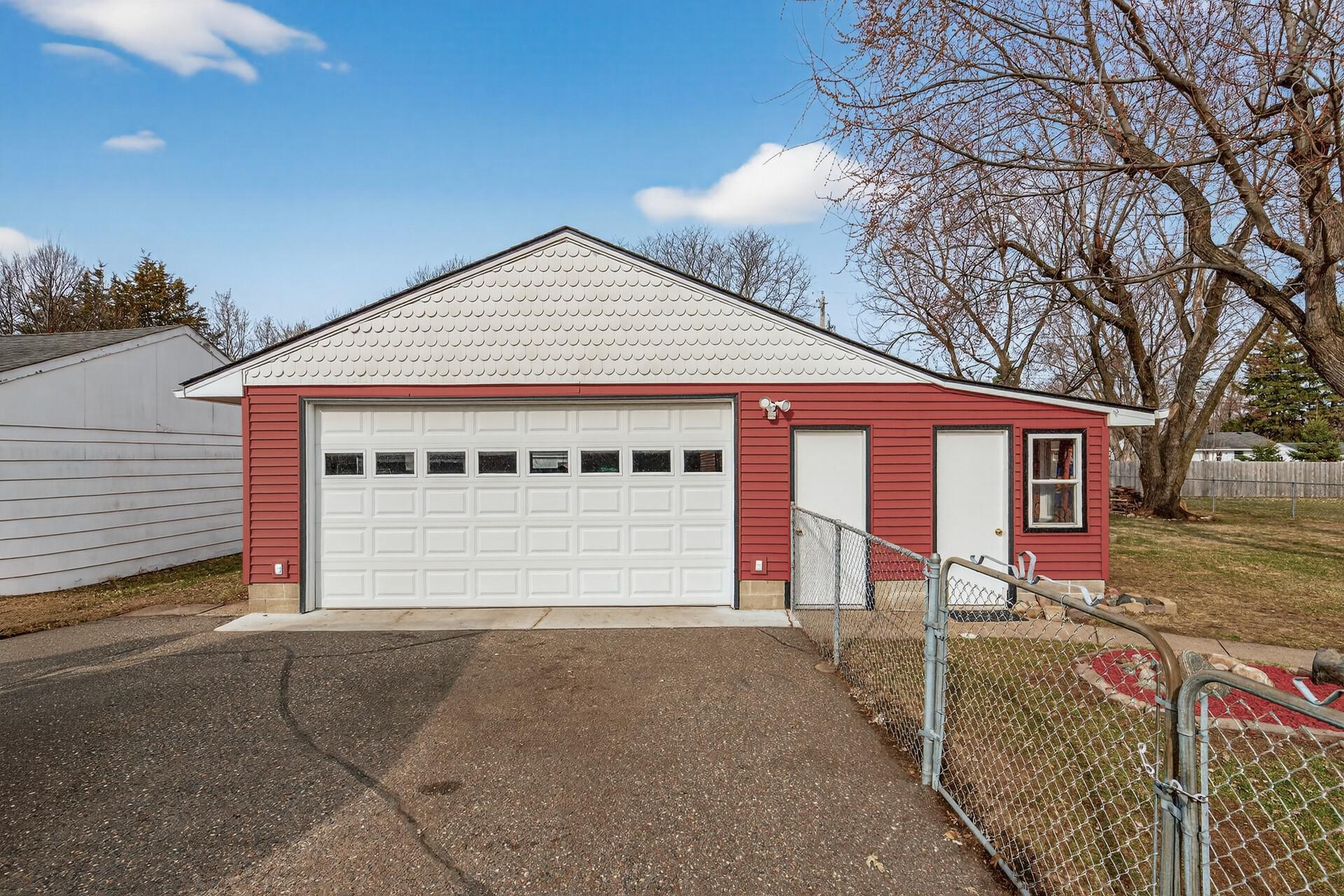 Oversized heated garage with heated lean-to and additional storage at the back