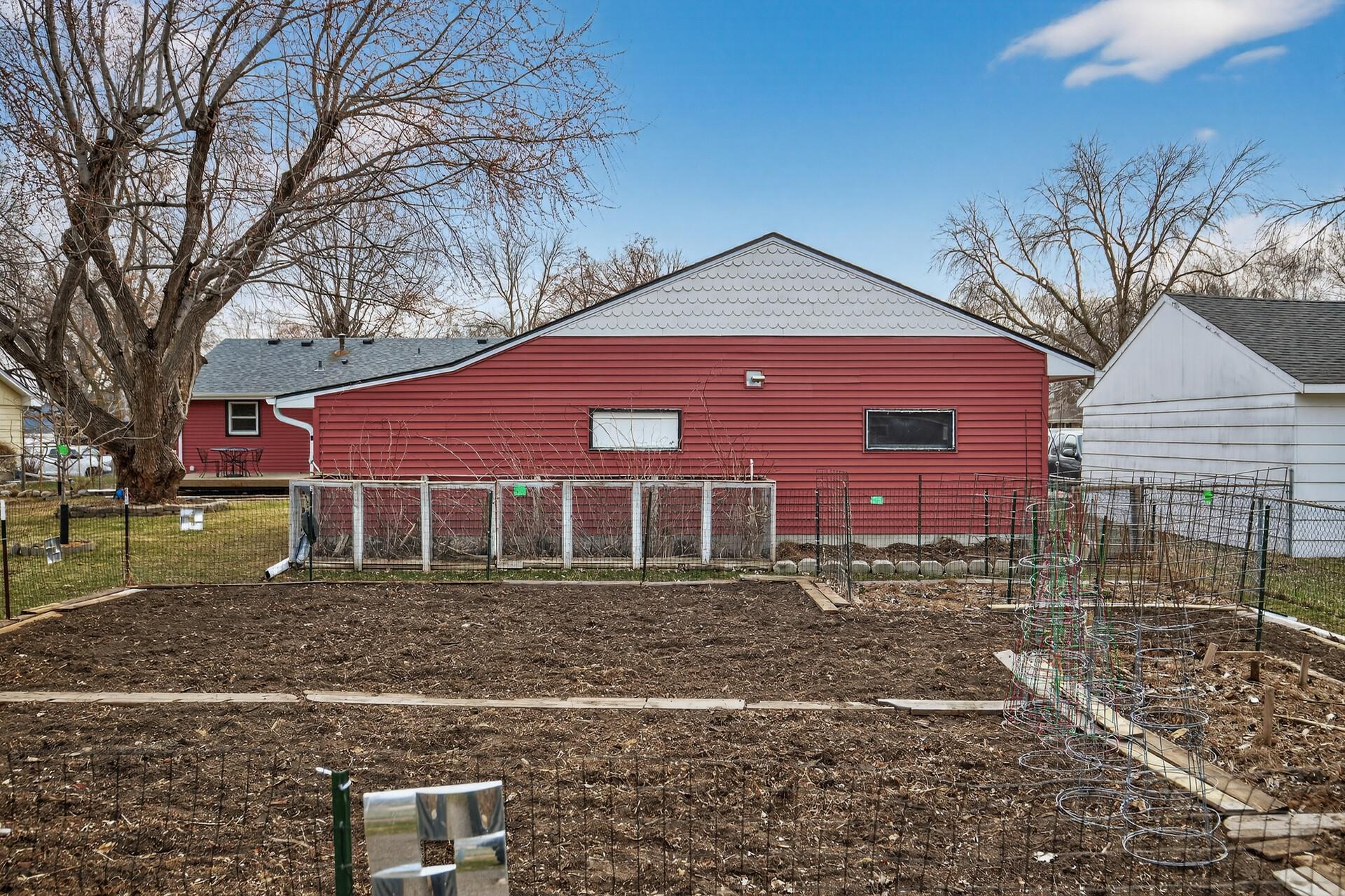 Garden space prepped and ready, with soil already turned for planting.