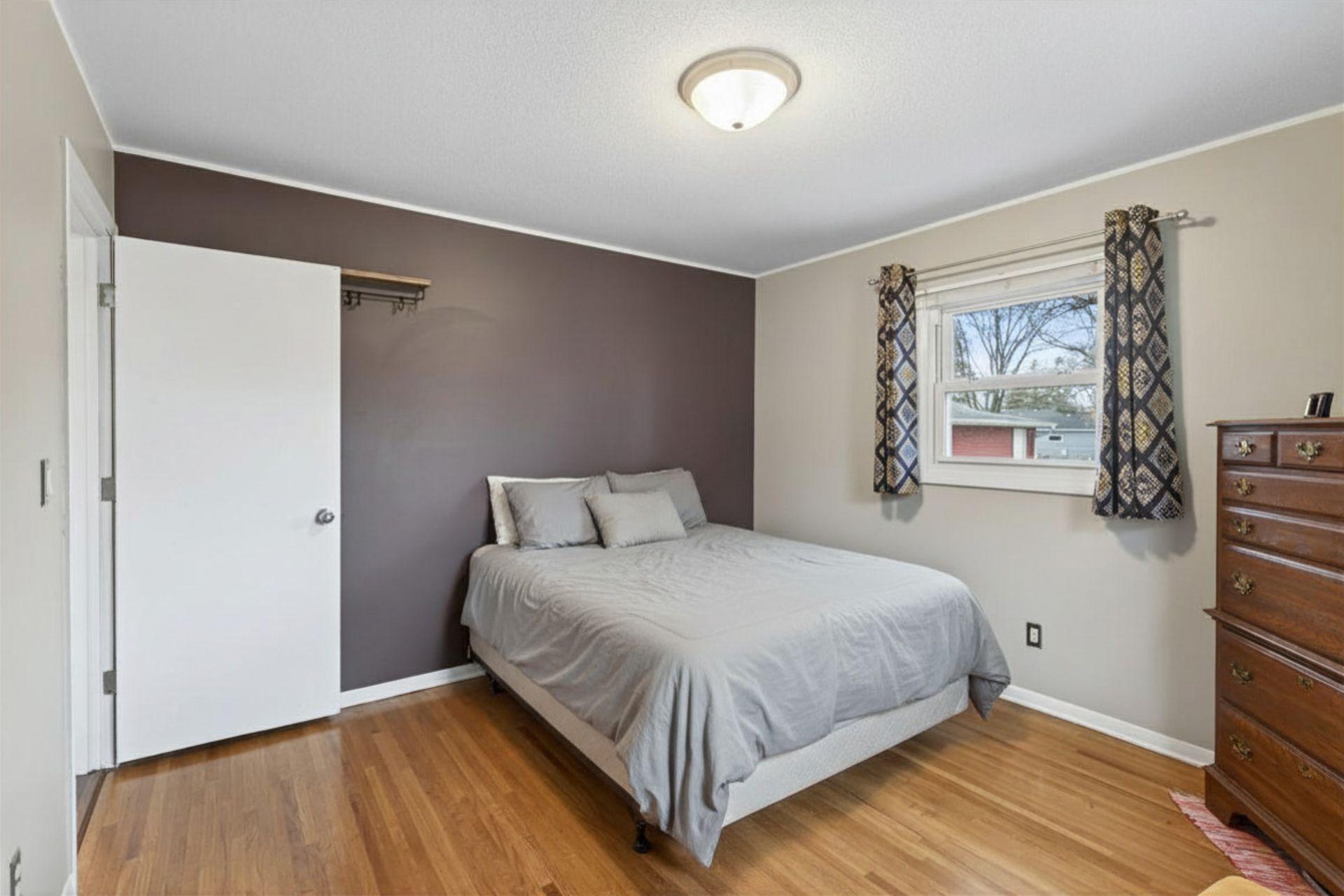 Main floor bedroom #2 with a simple, functional layout.