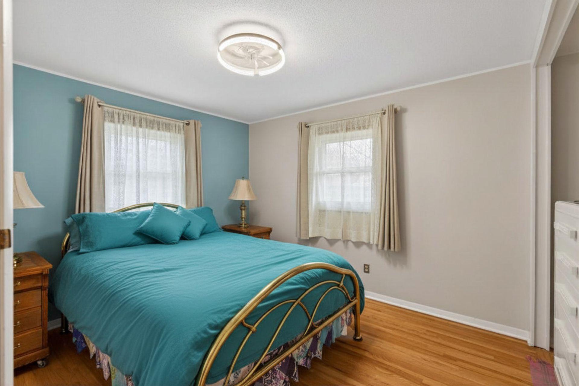 Bedroom #1 on the main floor features two closets for extra storage.