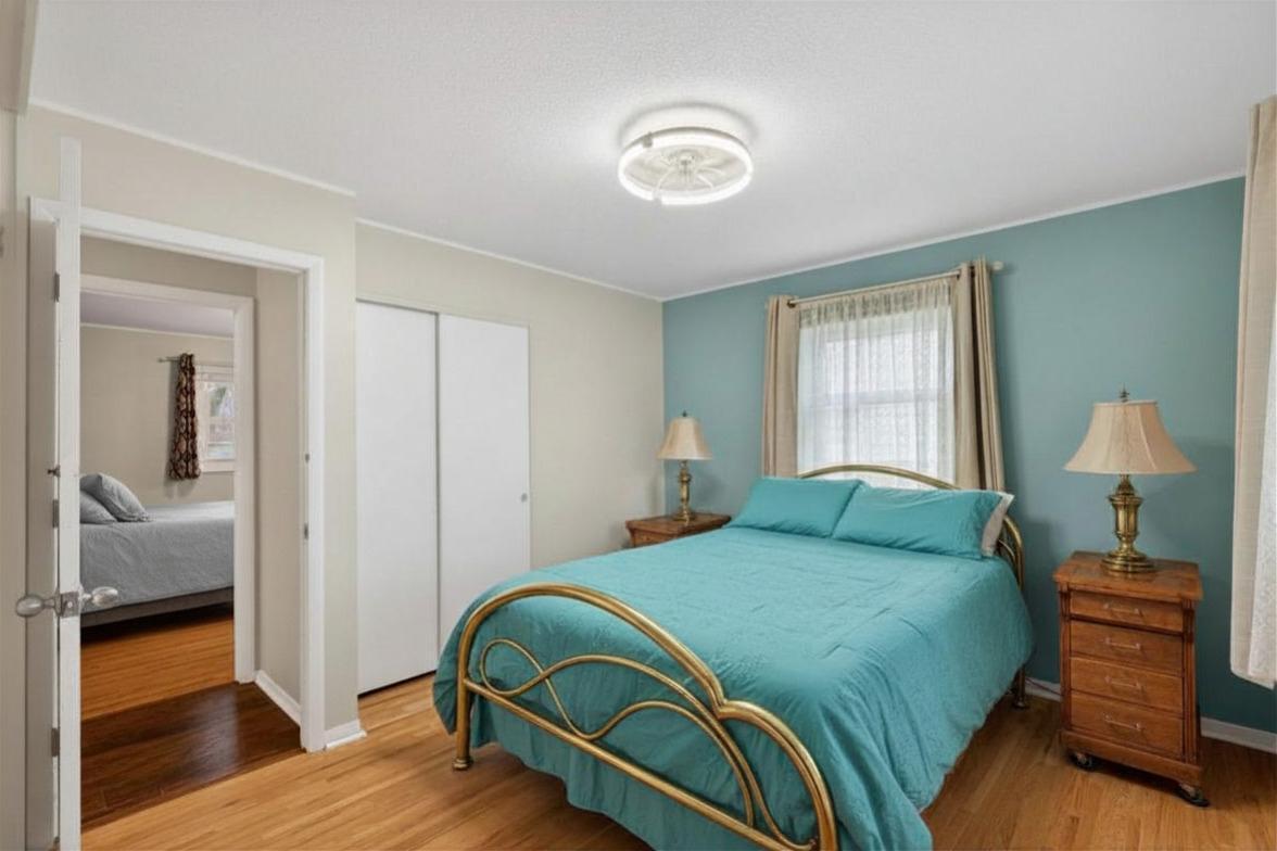 Bedroom #1 on the main floor features two closets for extra storage.