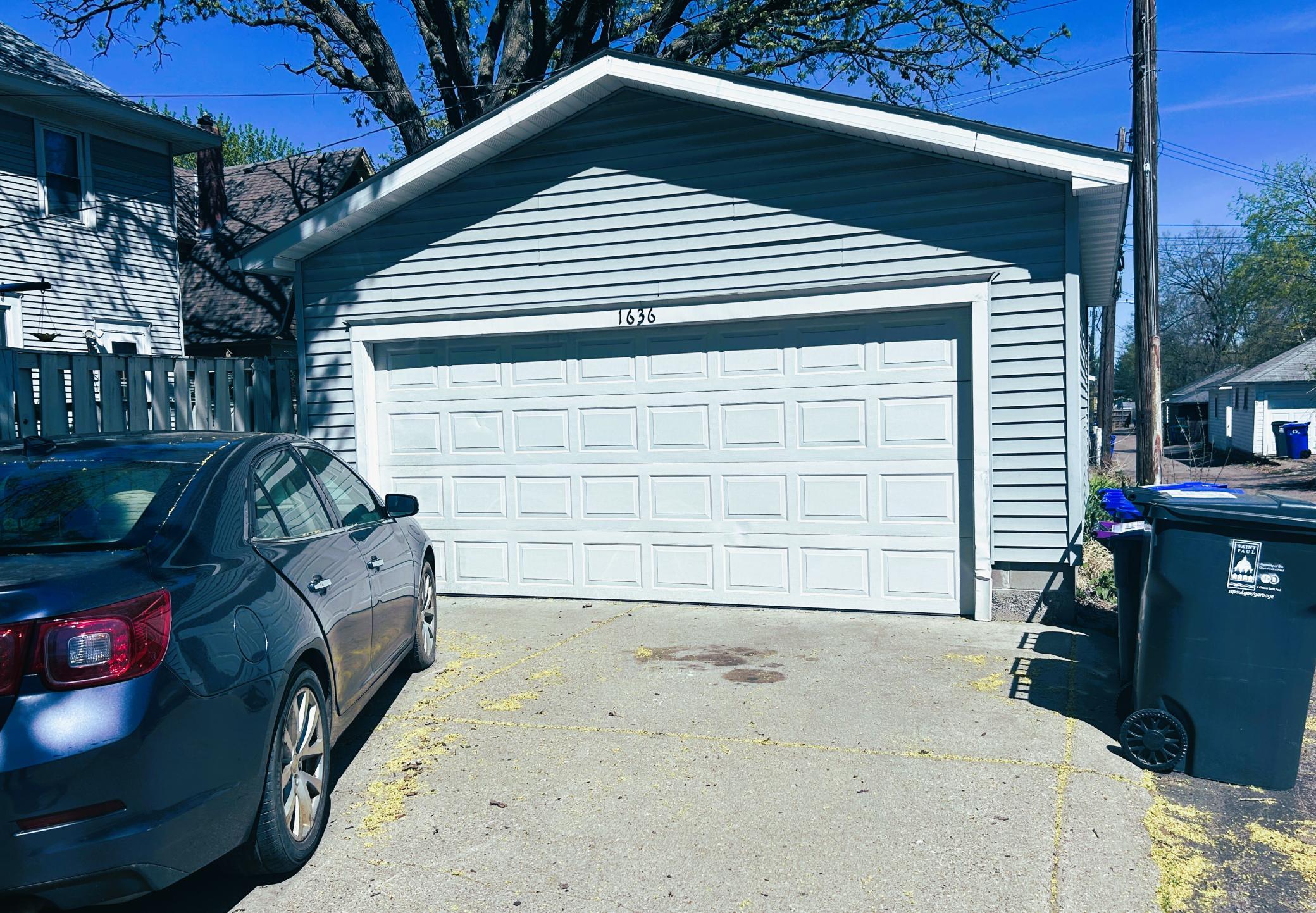 Off street parking in garage + two more on the cement pad.