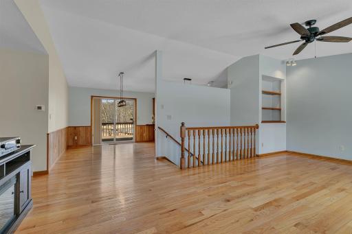 Bright and inviting entry and living room - flows nicely into the dining+kitchen