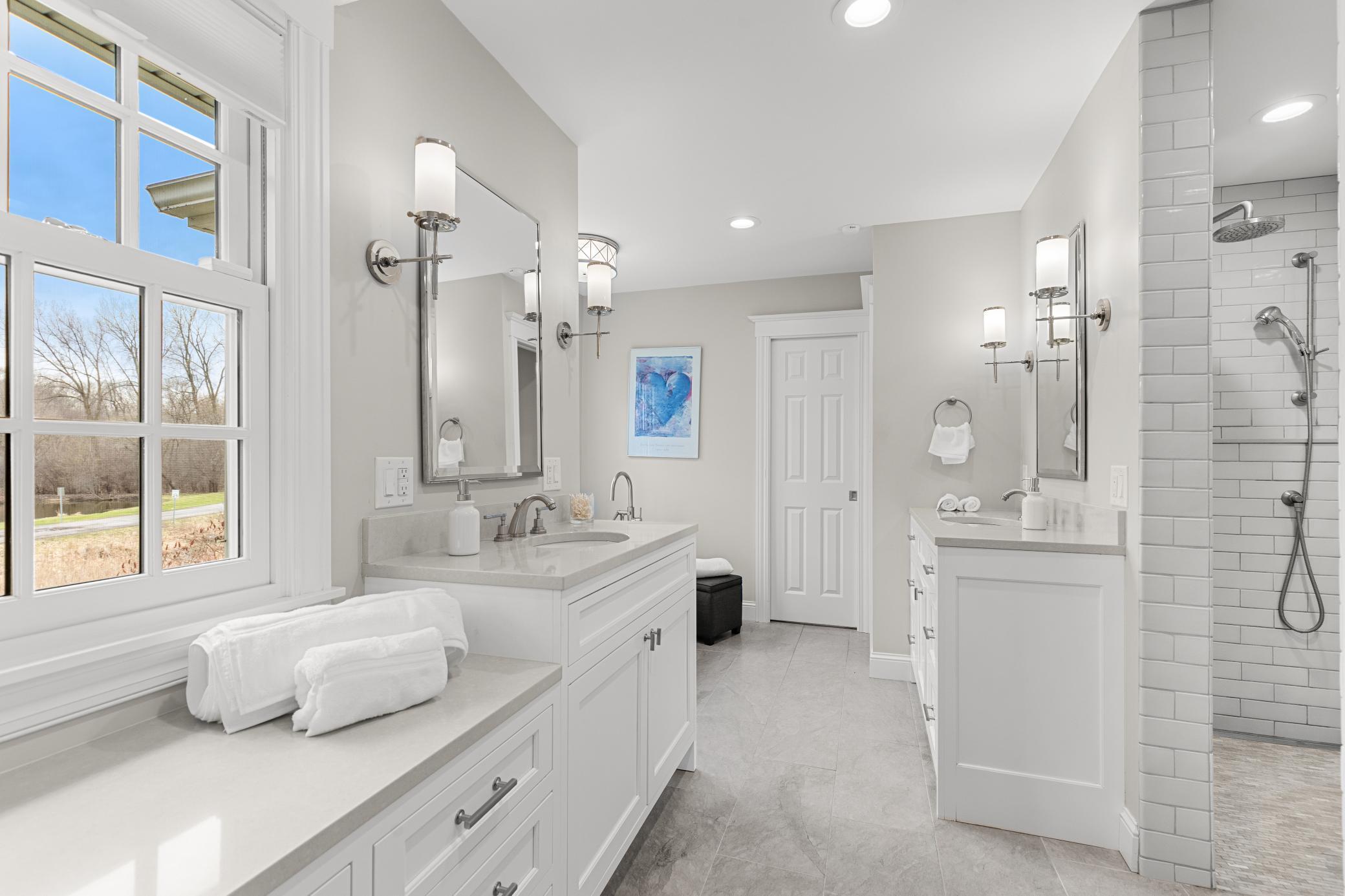 Primary bath - enameled built ins and quartz finishes