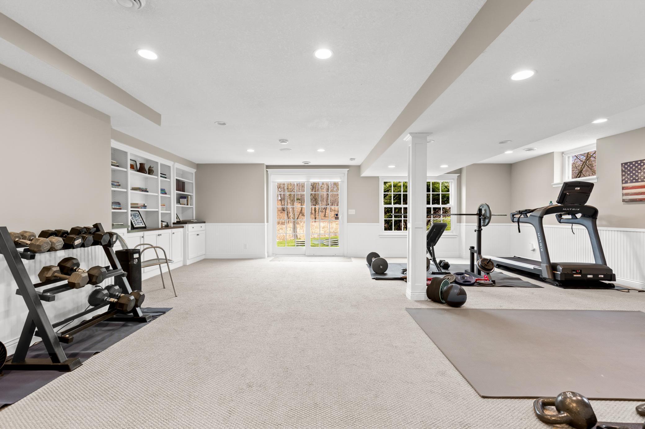 Exterior entrance and natural light in the lower level