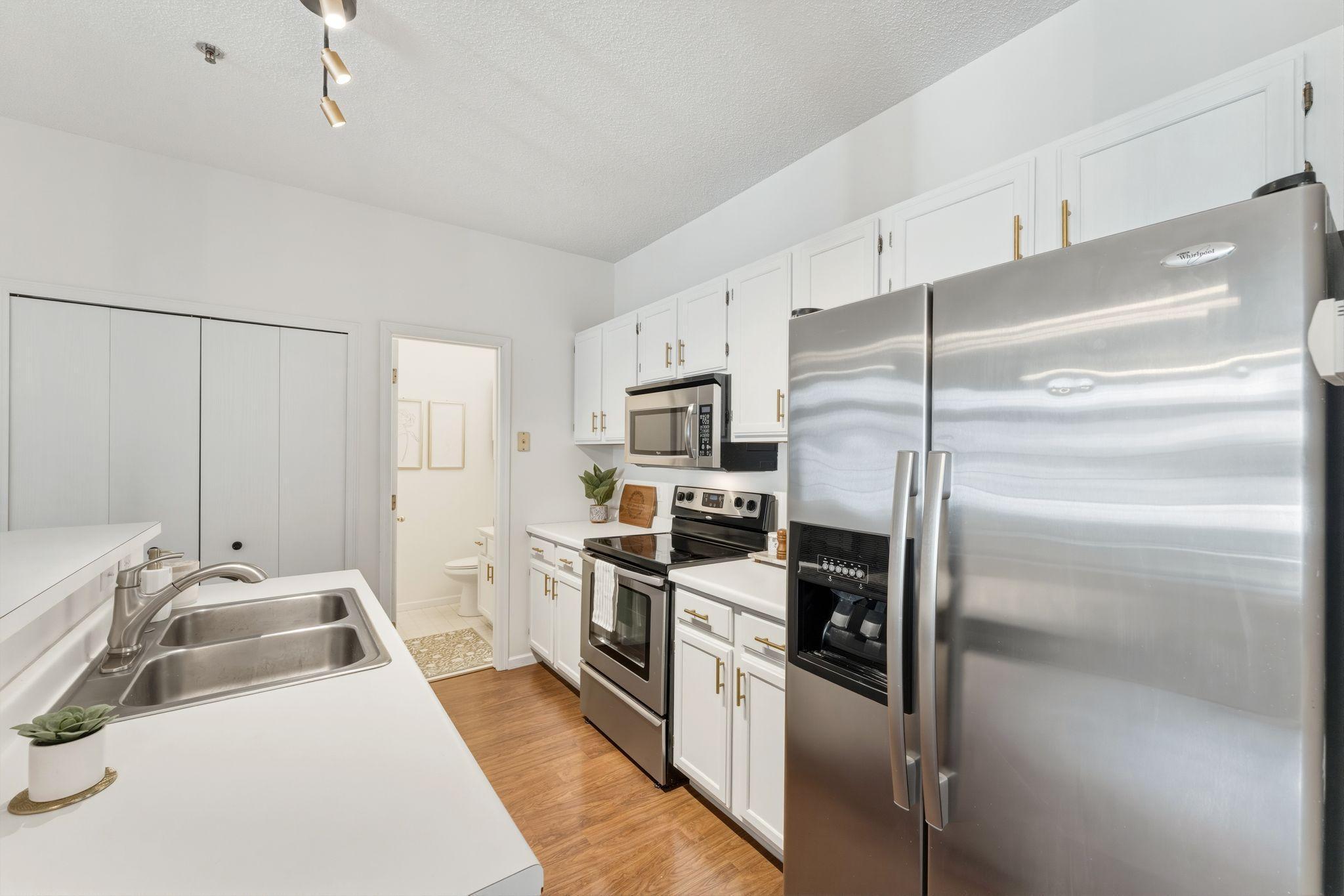 The kitchen features stainless steel appliances!