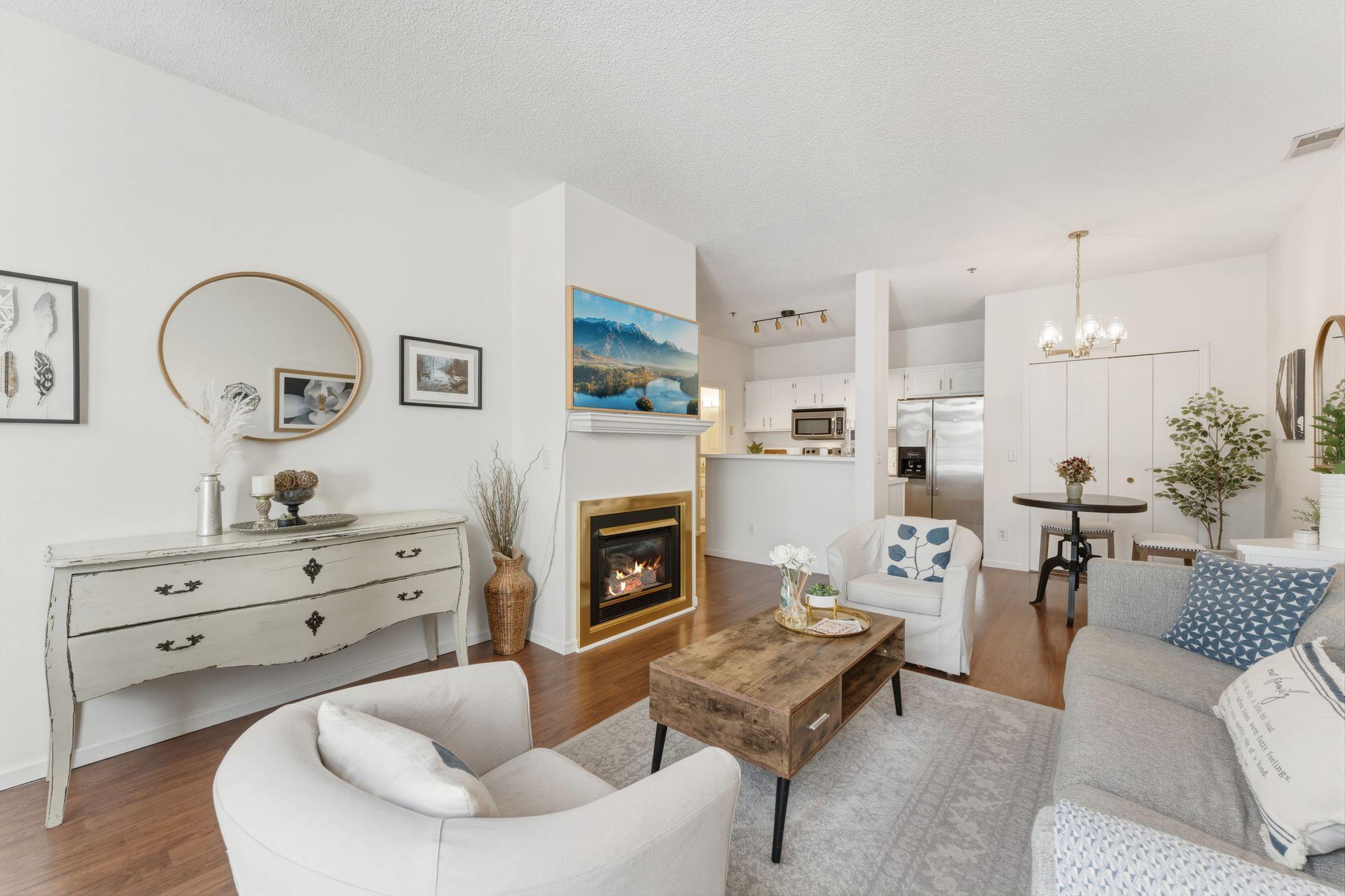 The living room features a gas fireplace