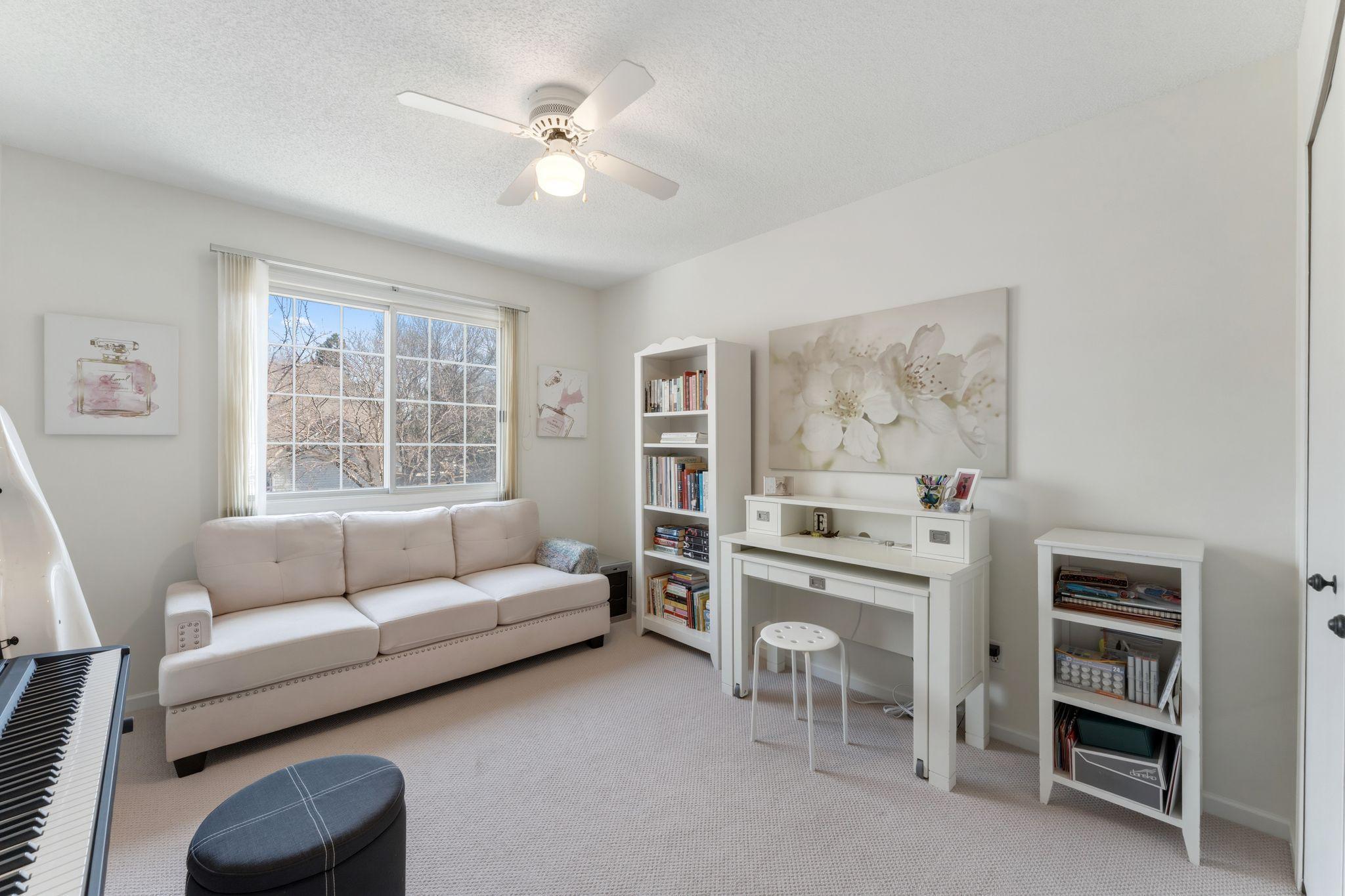 The second bedroom is also spacious and bright.