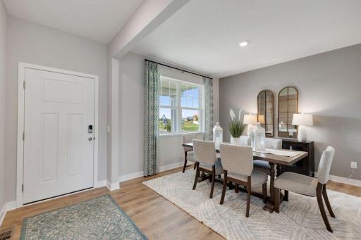Spacious foyer makes it easy to move around and is open to your formal dining room. Photos of model, options may vary.
