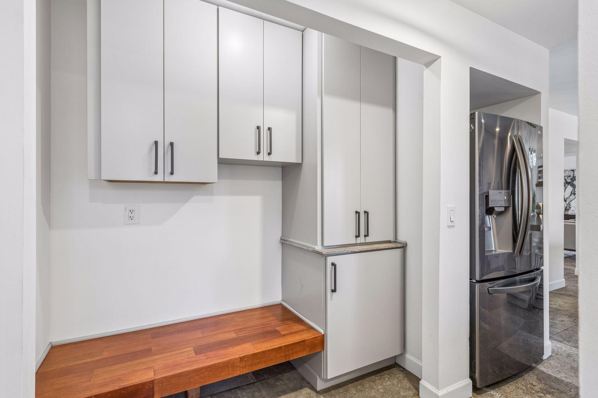 Mudroom and 1/2 bath just off the garage with convenient built-in storage.