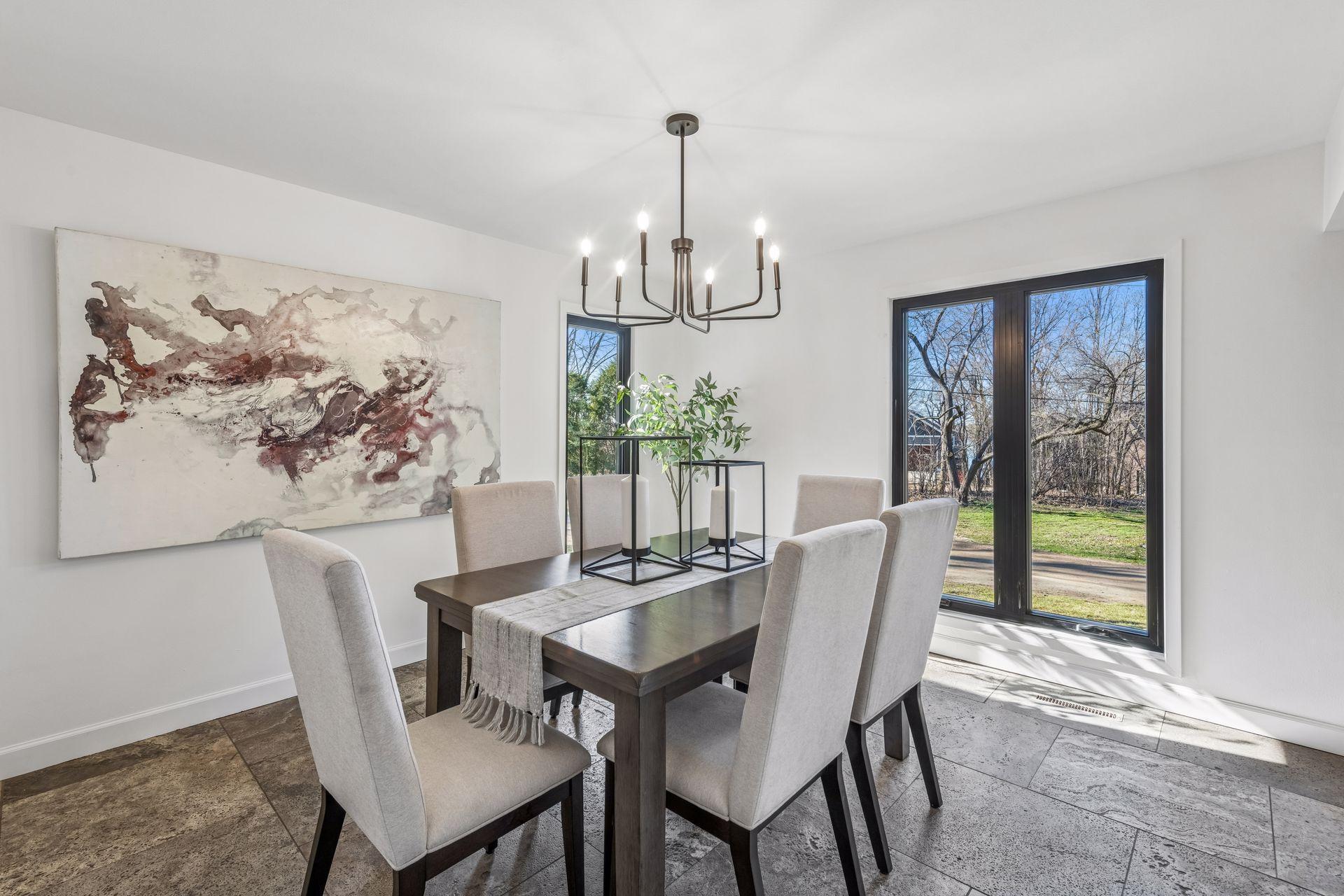 Dining room features large windows.