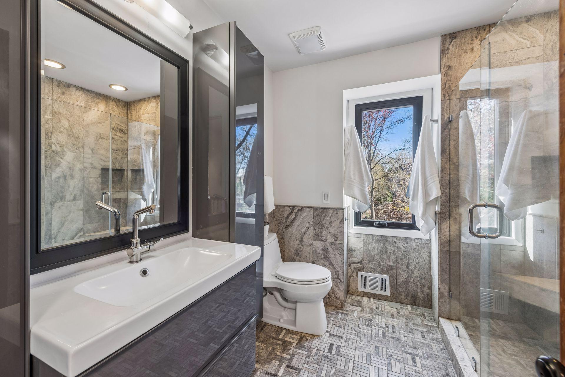 Upper level 3/4 bathroom.