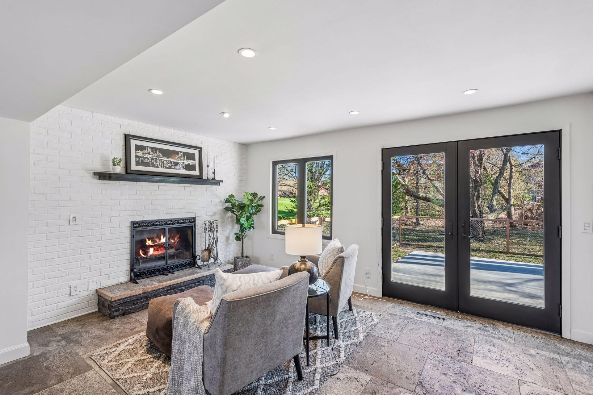 Sitting area with wood fireplace.