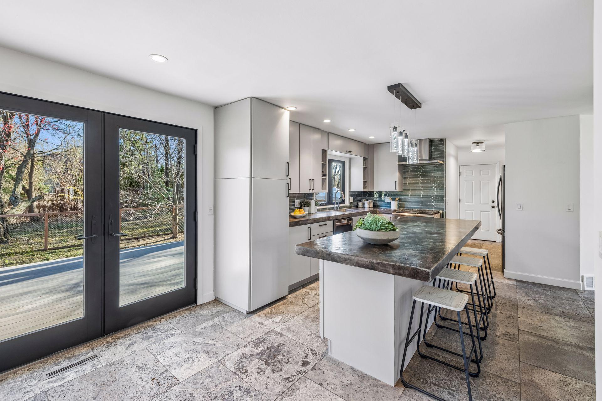 The kitchen features a large center island.