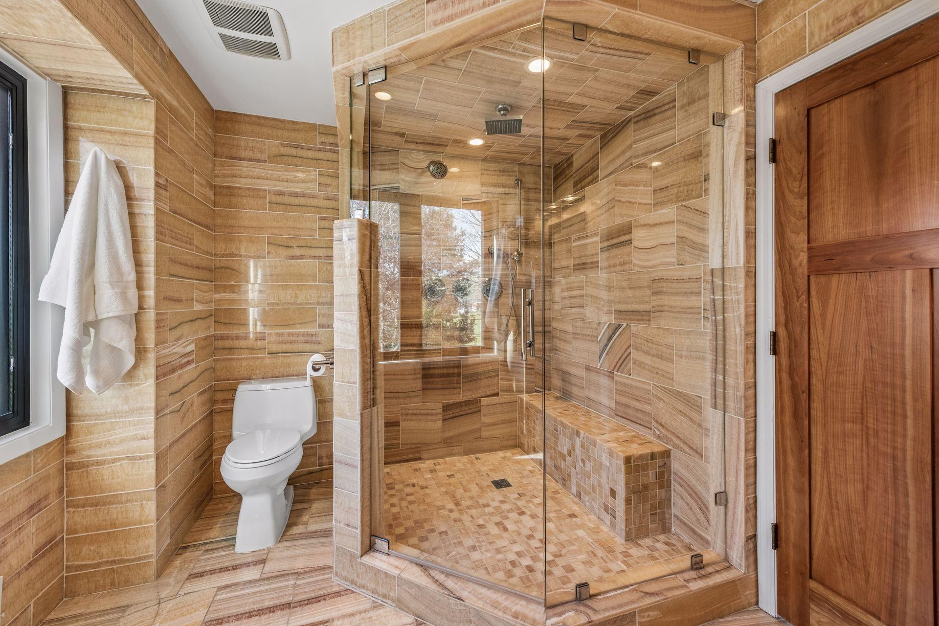 Heated floors, beautiful onyx tile and spacious shower