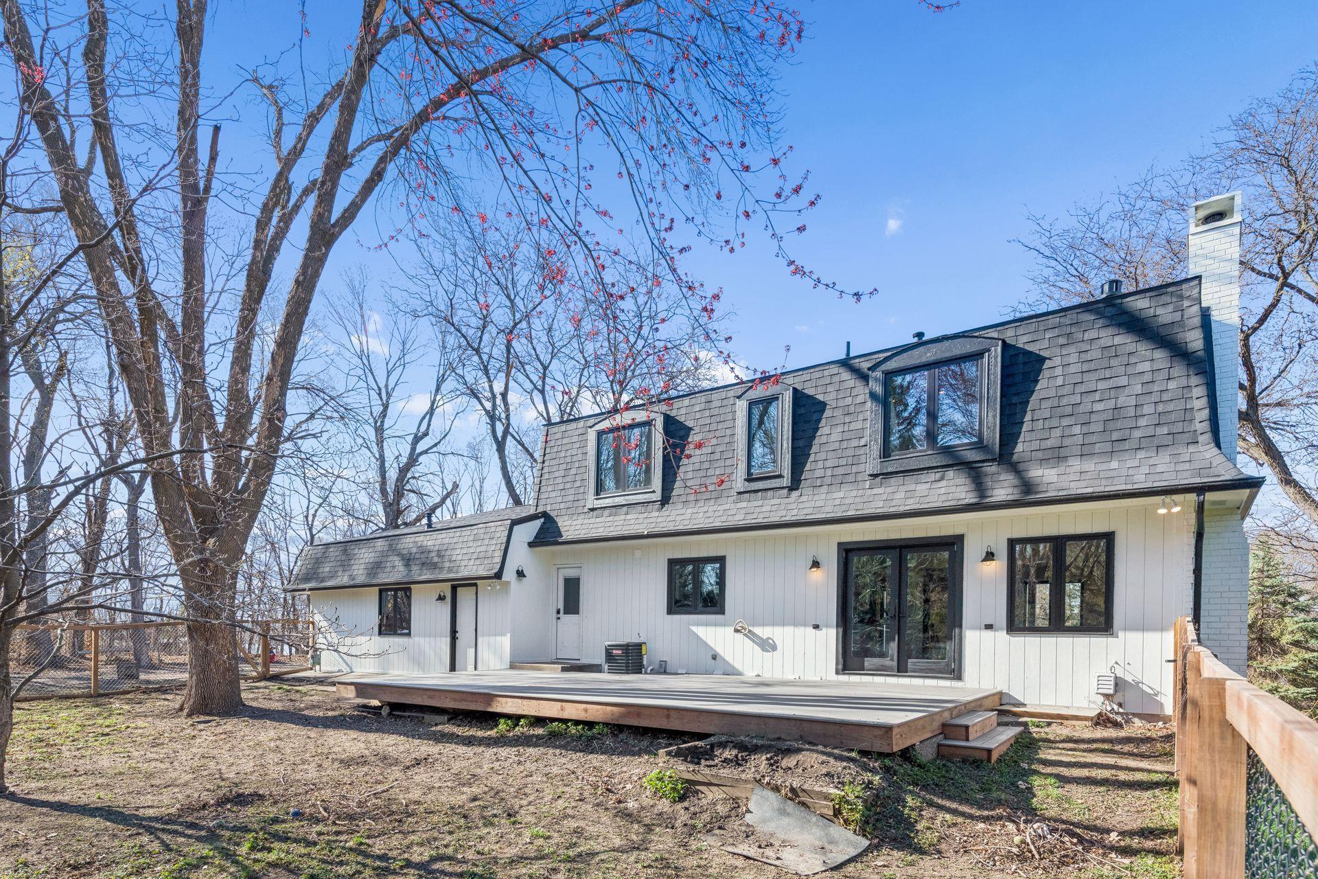 Deck access from kitchen/dining area and mudroom.