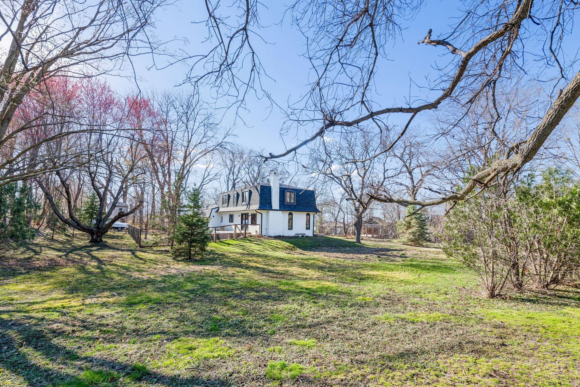Almost an acre (0.9 acres) of green space and mature trees. Room for an ice rink or large garden.
