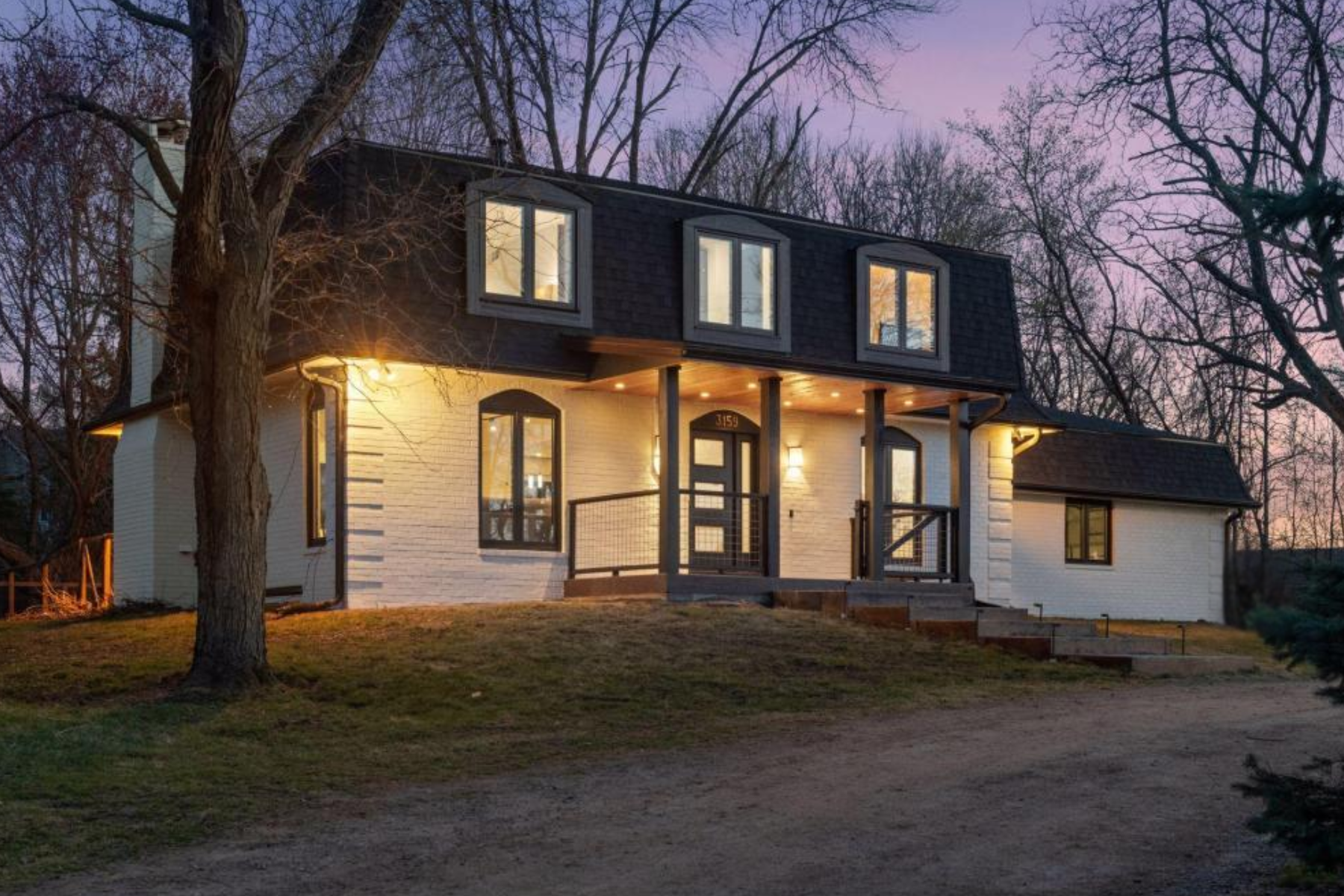 Inviting updated Minnetonka Beach property offers a rare blend of charm, character, and privacy