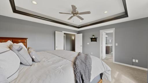 26 Primary Suite w:recessed lighting and ceiling fan.jpg