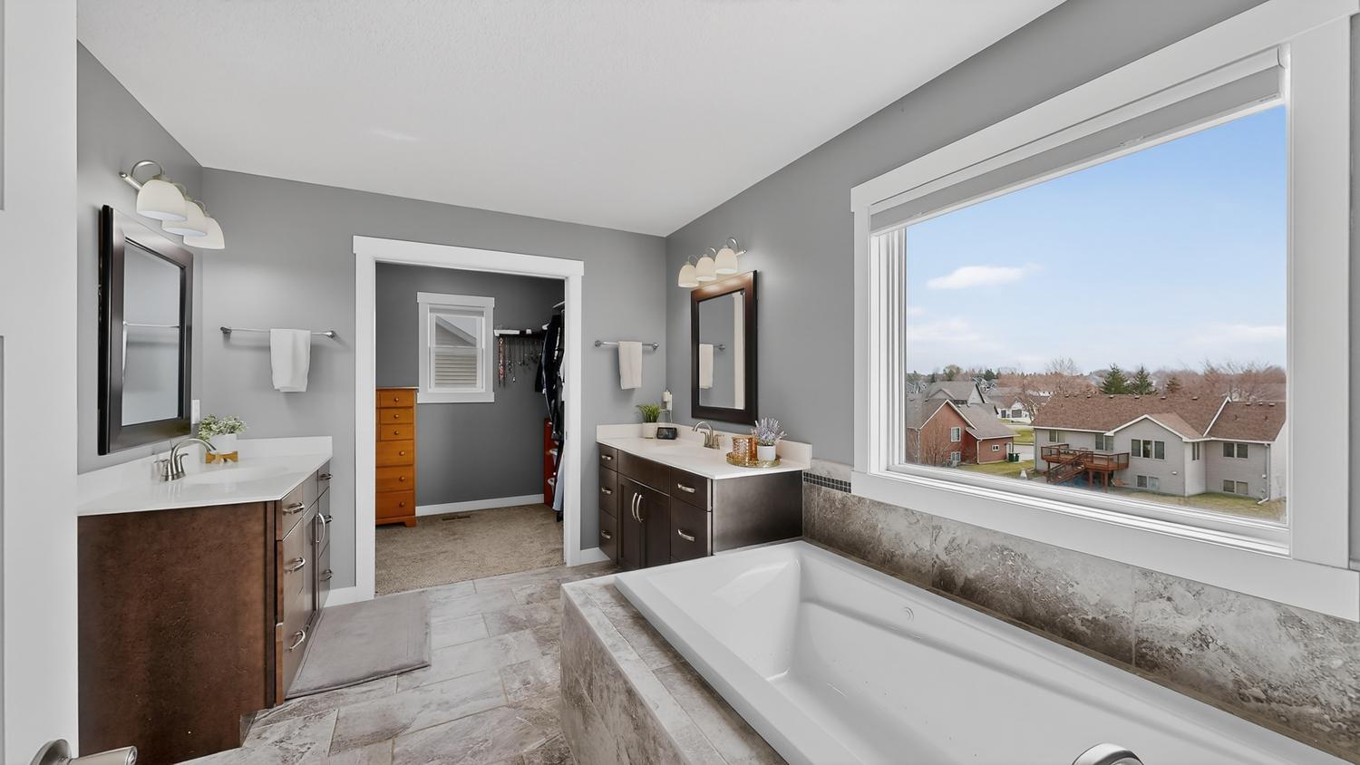 28 Primary Full Bathroom w:tub & two sinks.jpg