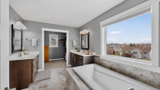 28 Primary Full Bathroom w:tub & two sinks.jpg