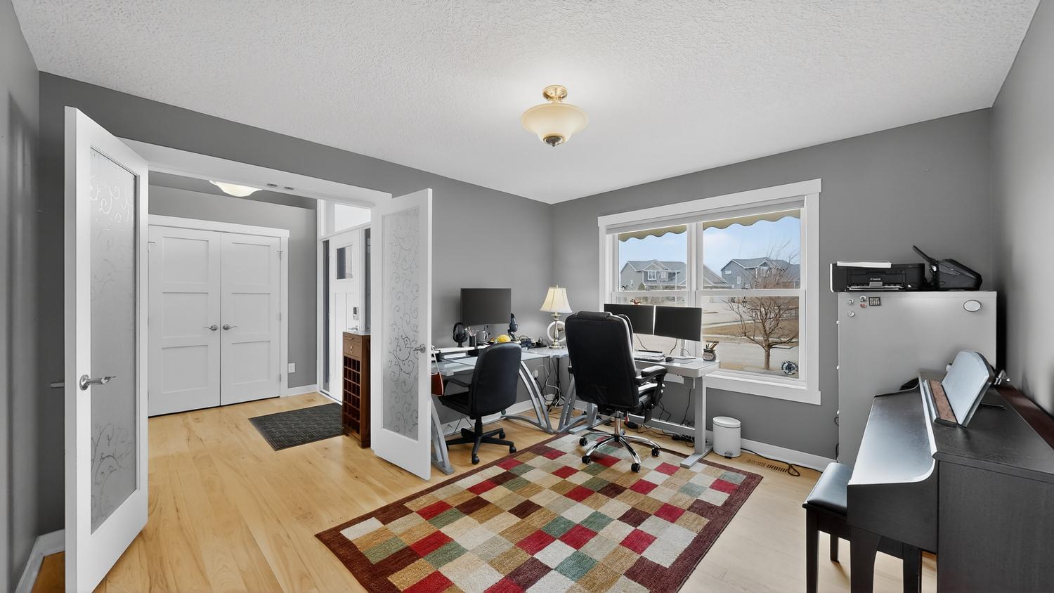 11 Main floor Office w:etched french doors.jpg