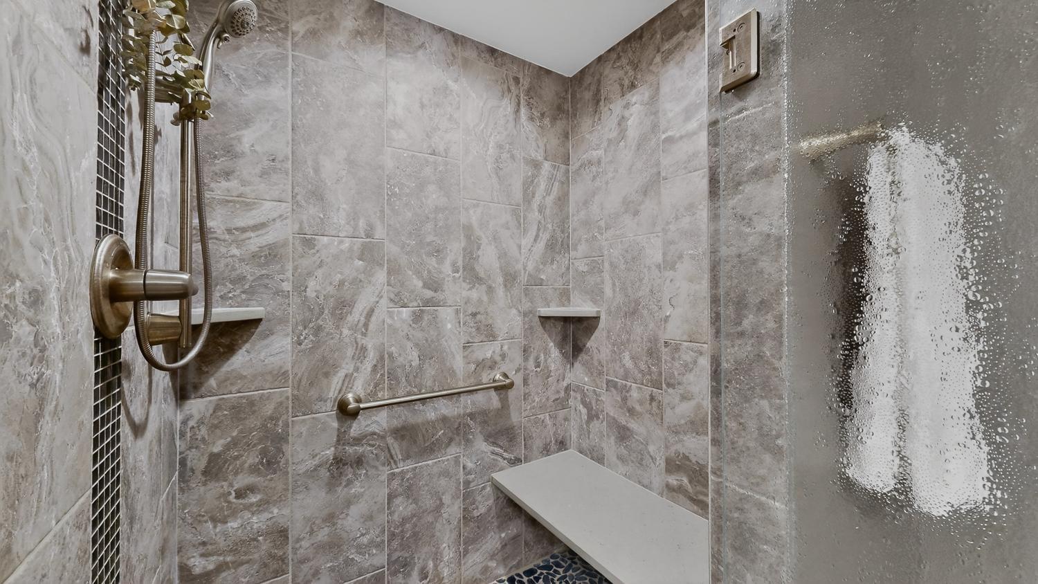 48 Lower Level Tiled 3:4 Bath w:built-in bench.jpg