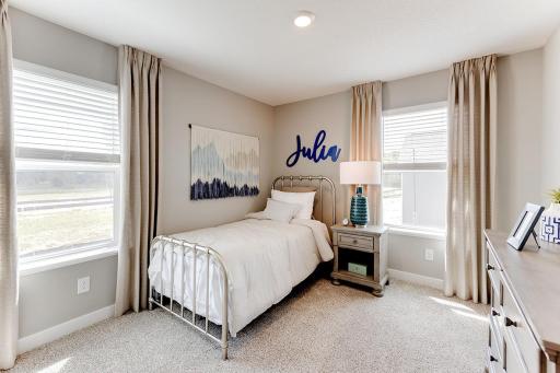 Bedroom 3. *Photos are of a previously staged model*