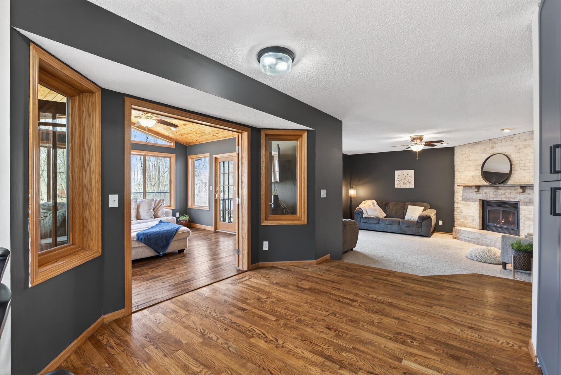 View of family room and 4 season porch