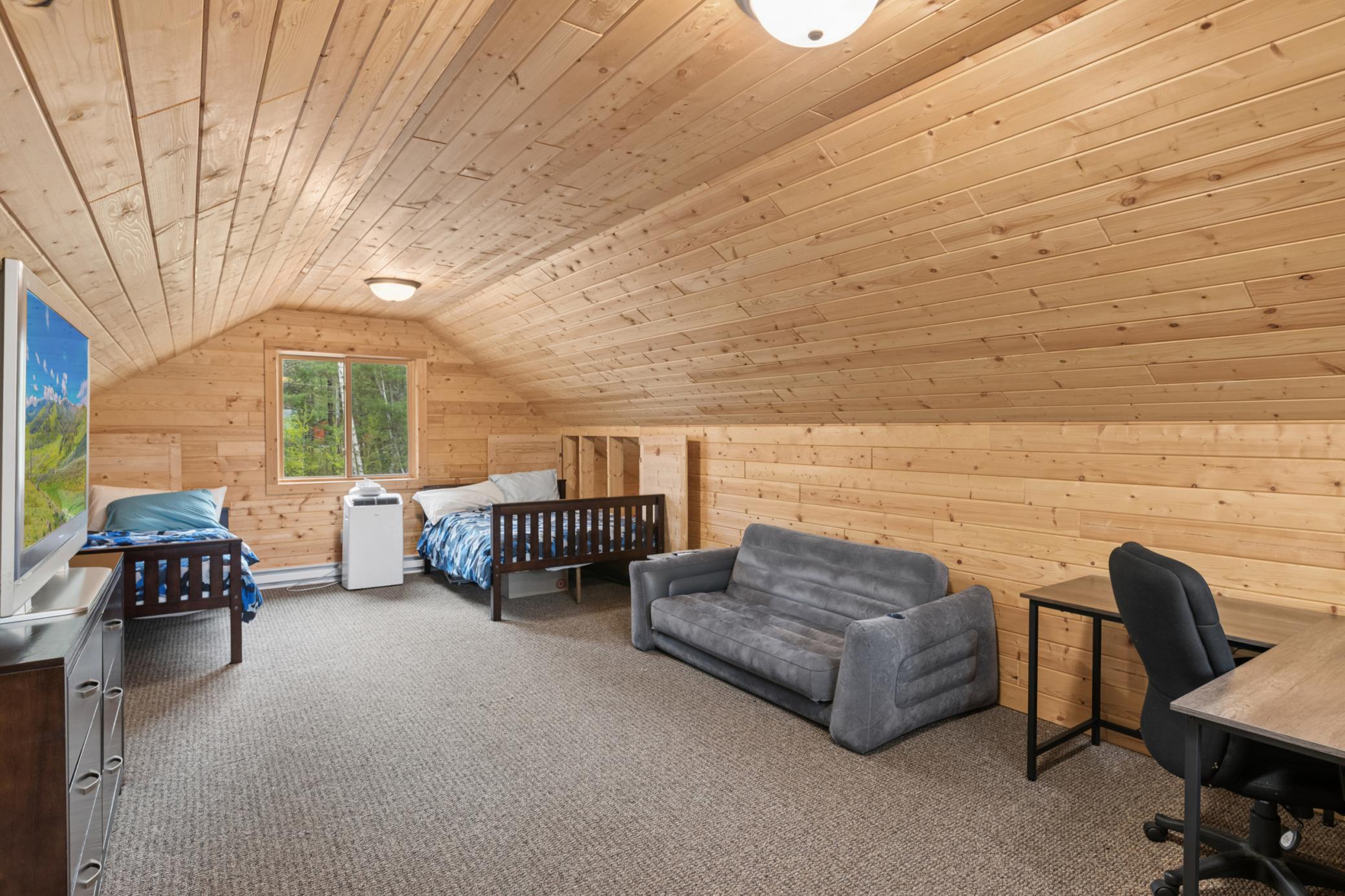 On the upper level of the 2-car garage - finished and so much extra sleeping space.