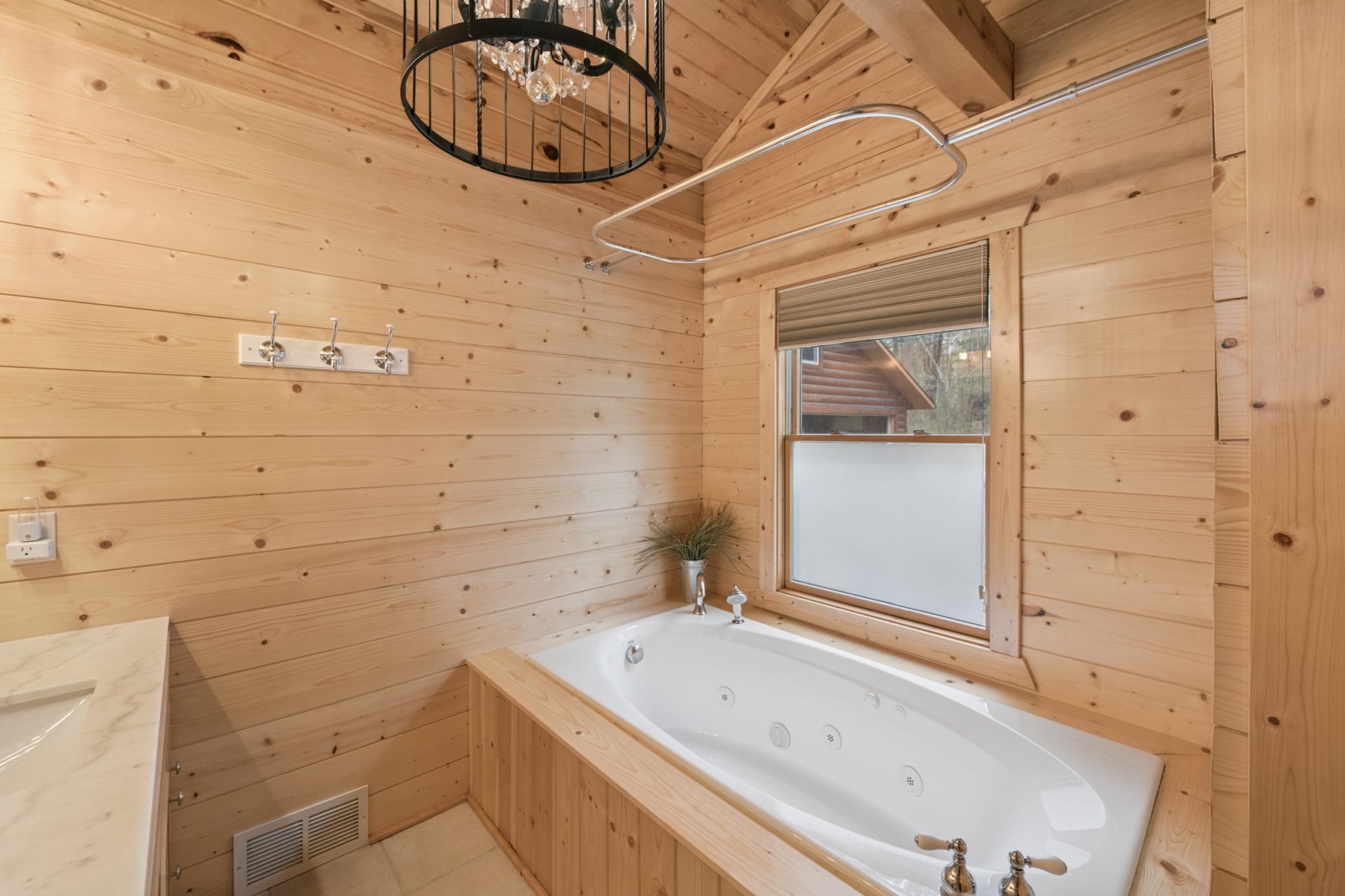 Jetted tub as part of the primary suite.